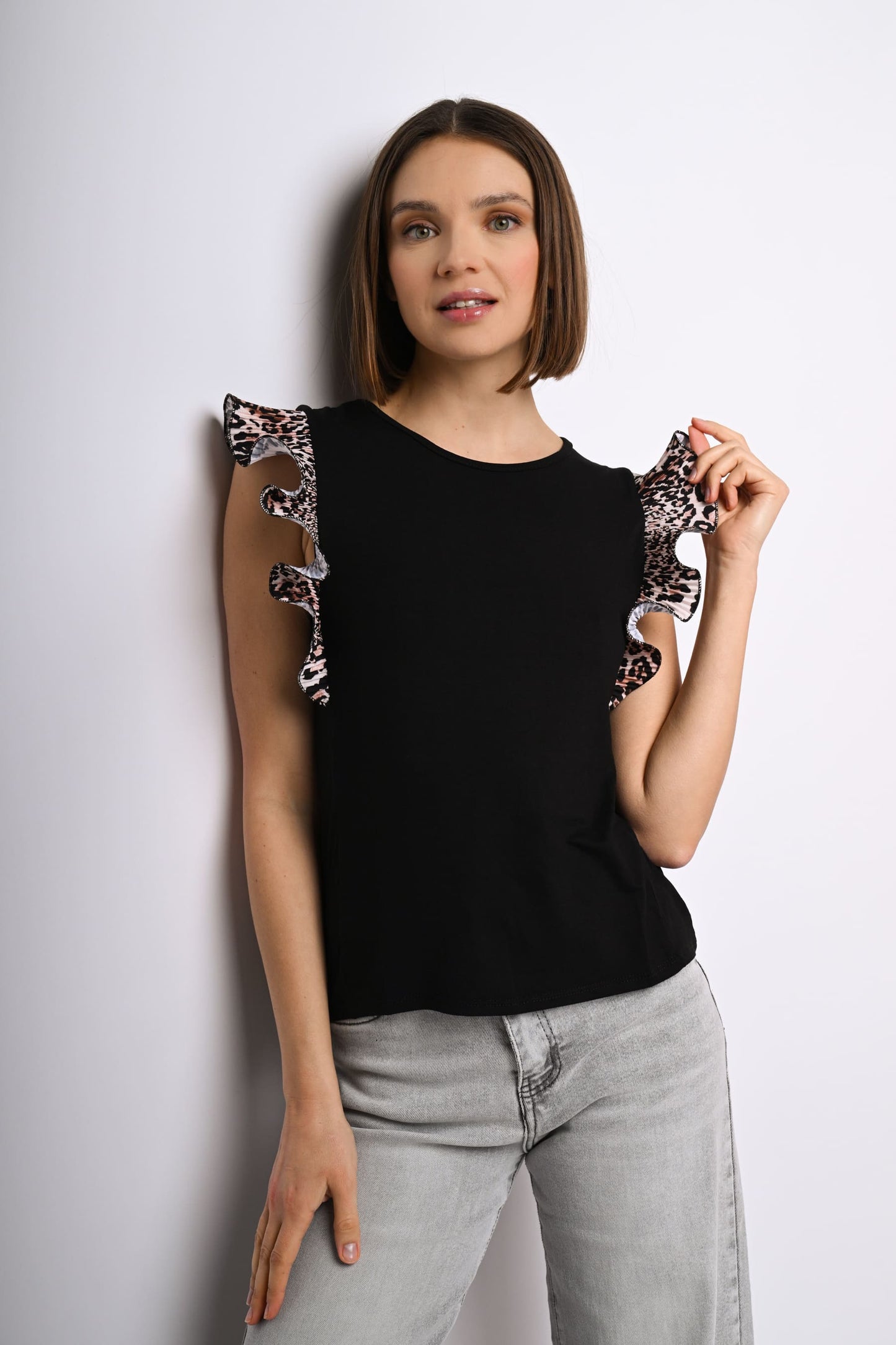 Top con rouches a stampa leopardata
