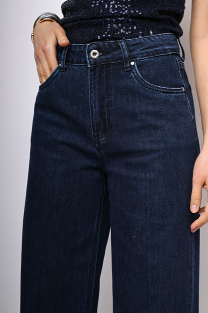 Jeans a gamba ampia con risvolto